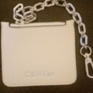 Calvin Klein money holder clips on to any bag